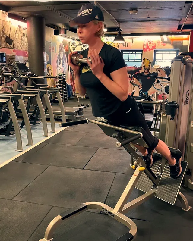 A member mid-set on a machine