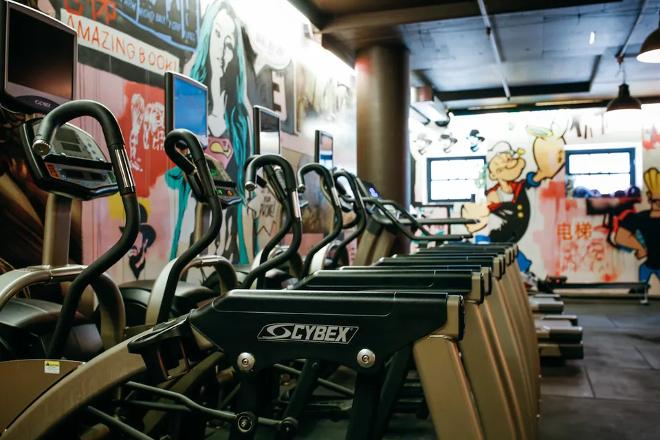 Cross-trainers and treadmills in the cardio room